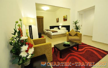 Номер отеля Ramada Hotel & Suites Ajman 4*