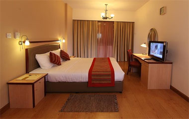 Номер отеля Flora Grand Hotel Apartments Номер отеля Flora Grand Hotel Apartments