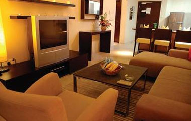 Номер отеля Lotus Grand Hotel Apartment 4*