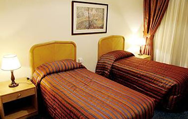 Номер отеля Oasis Court Hotel Apartments 3*