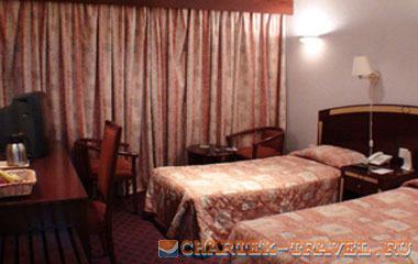 Номер отеля Sandras Inn Hotel 3*