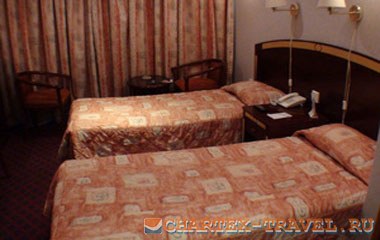 Номер отеля Sandras Inn Hotel 3*