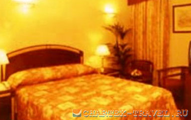 Номер отеля Sandras Inn Hotel 3*