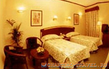 Номер отеля Sandras Inn Hotel 3*